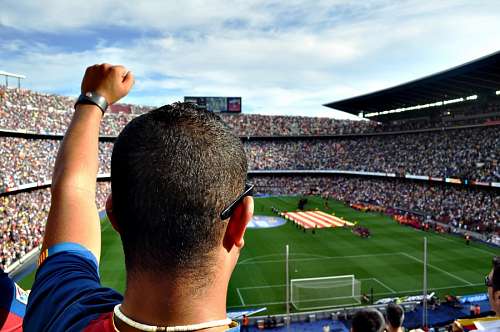 Fã em uma partida de futebol