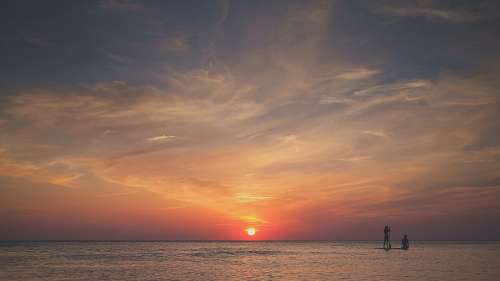 paddle Pôr do sol no mar